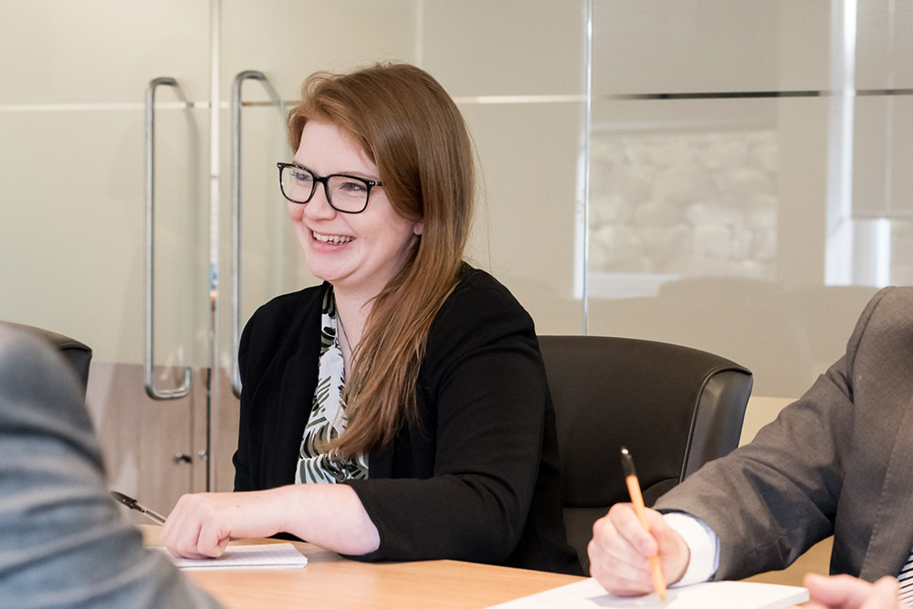 woman at boardroom table